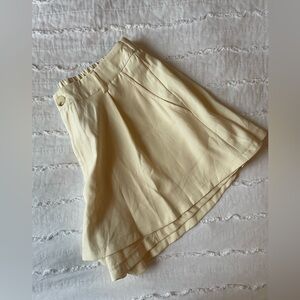 Cream Colored Shorts.
Size large